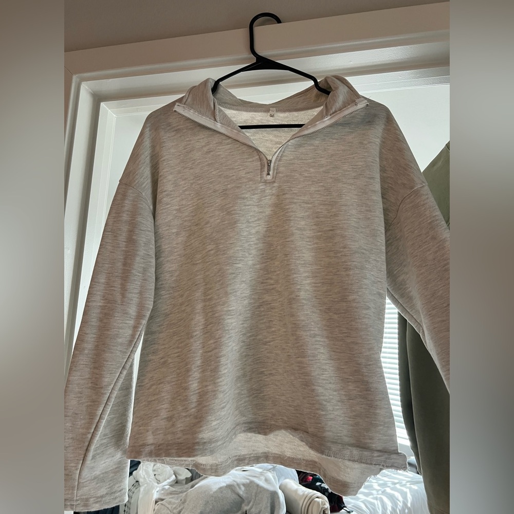 Grey quarter zip sweater
Size medium